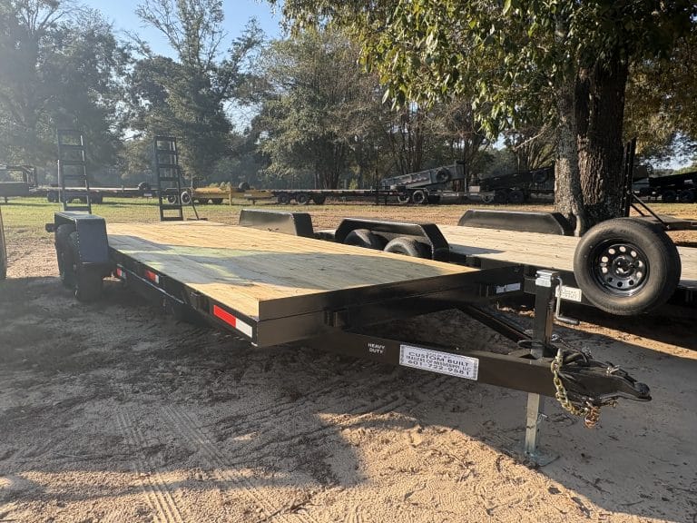 Car hauler trailer interior showing deck and side rails